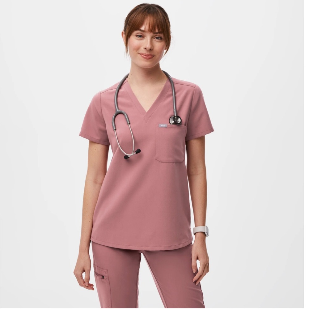 Figs scrubs. Color mauve. Size small top. Size small petite bottoms.